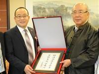 題匾勉銀帝粥会交流心連心