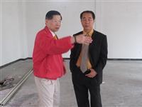全粥领导人视查总会馆施工