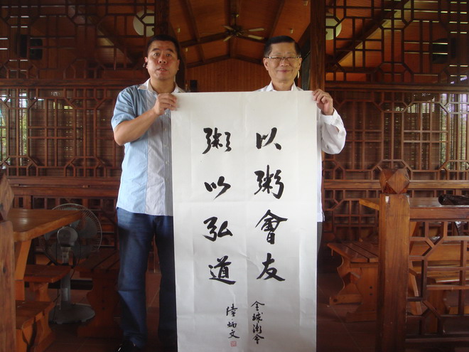 陆炳文寄厚望弘扬粥中有道