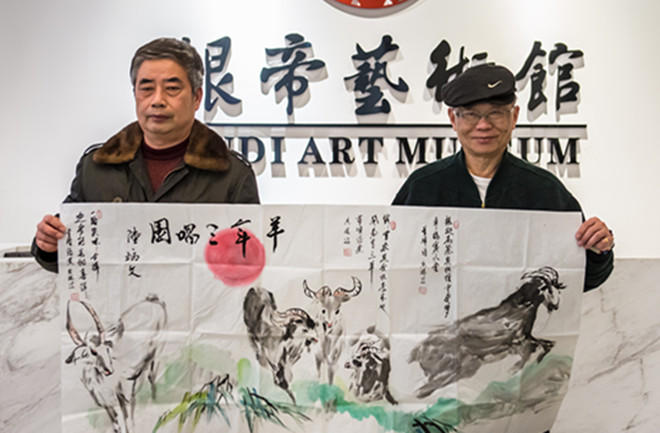 陆炳文挥毫题画羊年三唱图