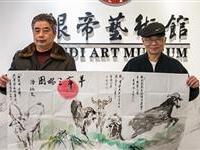 陆炳文挥毫题画羊年三唱图