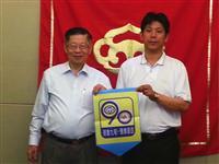 粥长会见城乡养老工委李卿