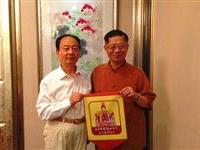 穗拜会孙中山基金会秘书长